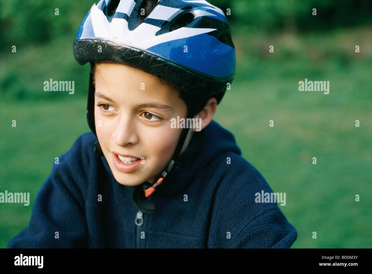Boy wearing cycling helmet Stock Photo Alamy