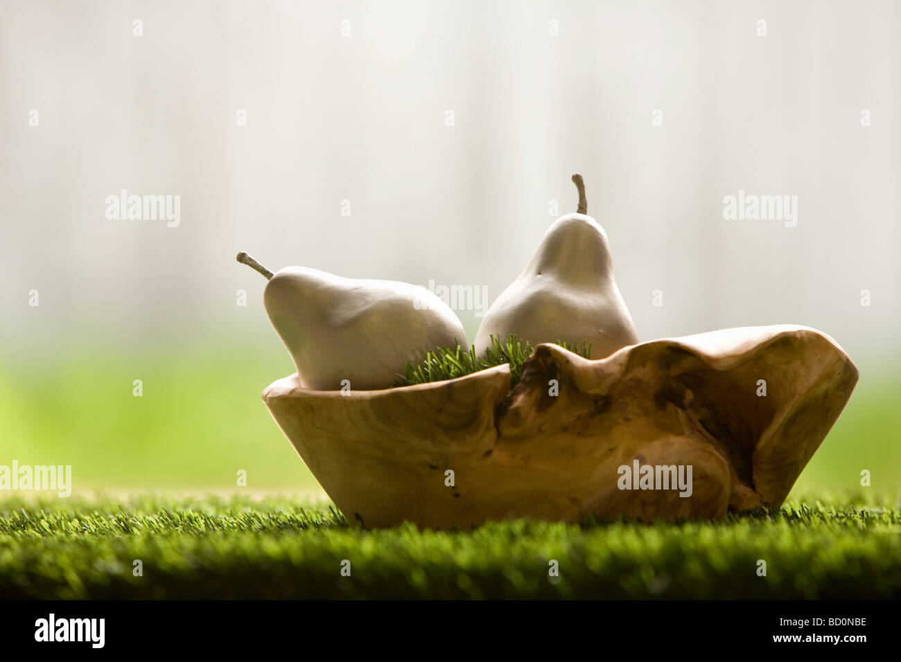 Silver pears in wooden bowl. Stock Photo