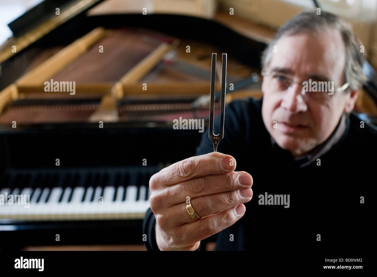 Piano man tuning hi-res stock photography and images - Alamy