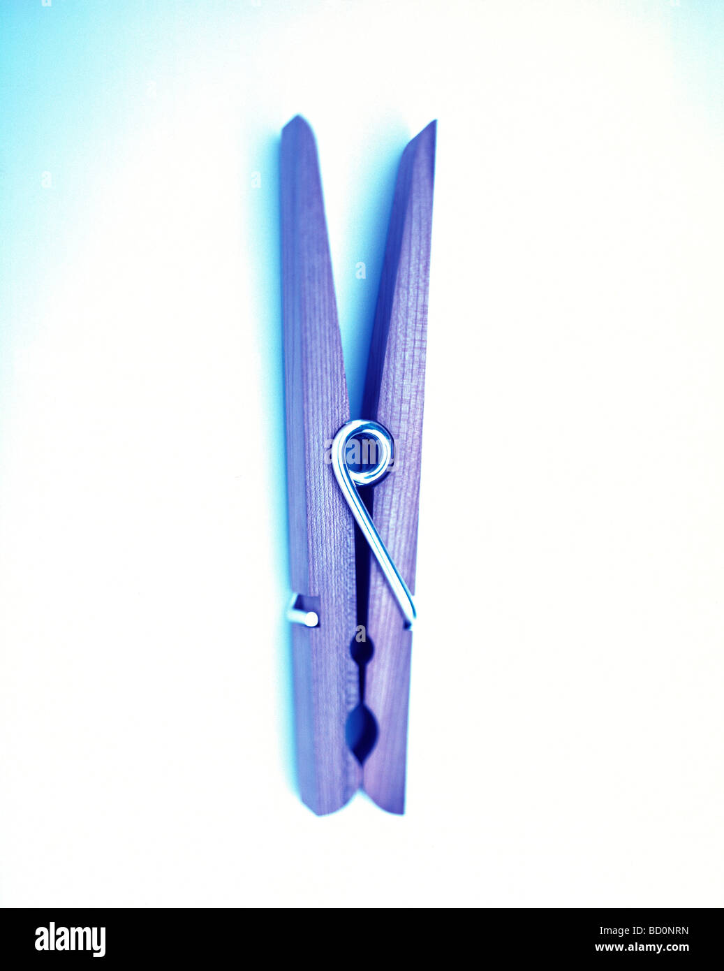 clothes peg, cross processed, white background Stock Photo