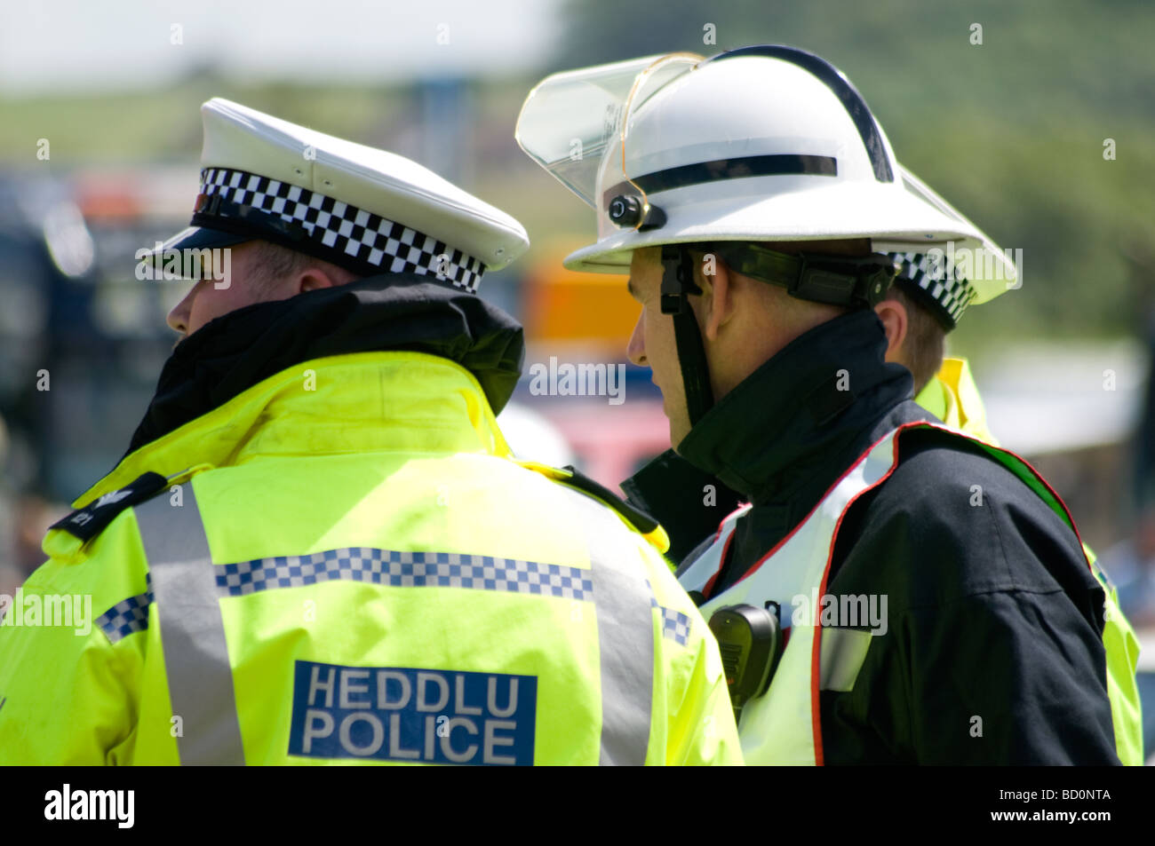 Trafic Police talk to fire crews at an RTA. Road Traffic accident. Stock Photo