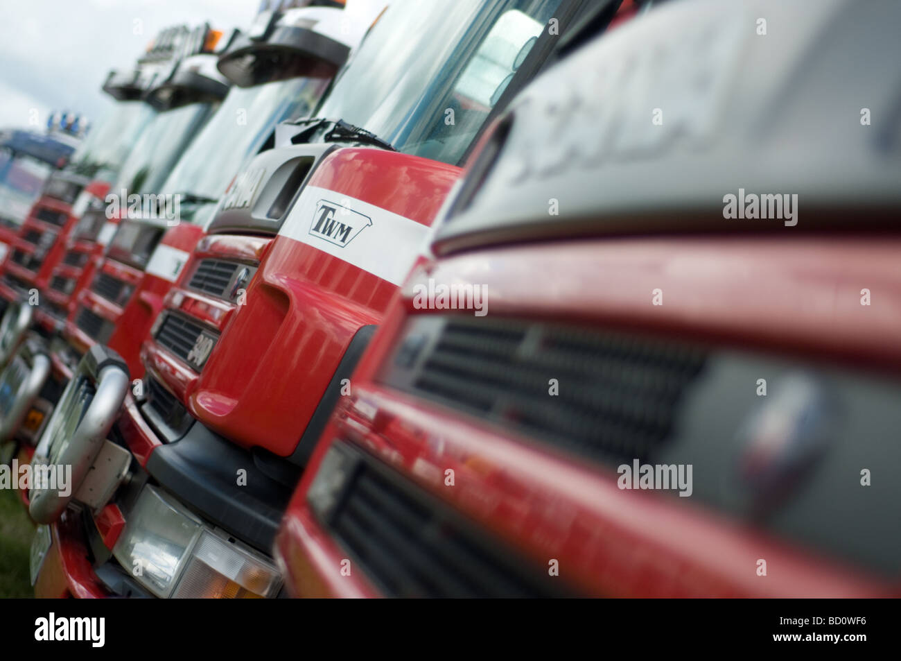 Row of red Trucks ready for work at the All wales truck show in Carmarthen Stock Photo