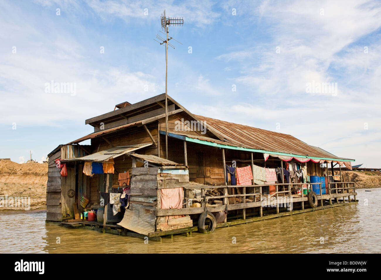 A floating house on Tong Le Sap Lake in Cambodia Stock Photo