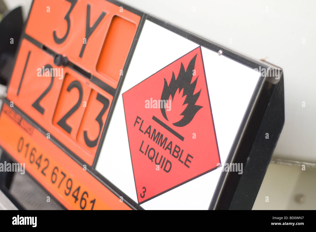 Close up of a flammable liquid sign on the back of a lorry or truck carrying dangerous liquid on the road Stock Photo
