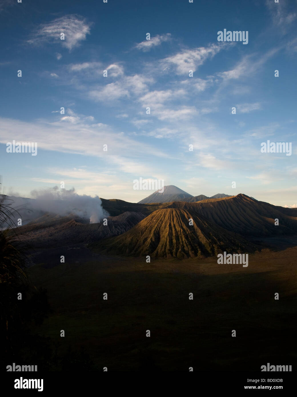 Sunrise over mount bromo and Batok with Mount semeru in the distance Stock Photo