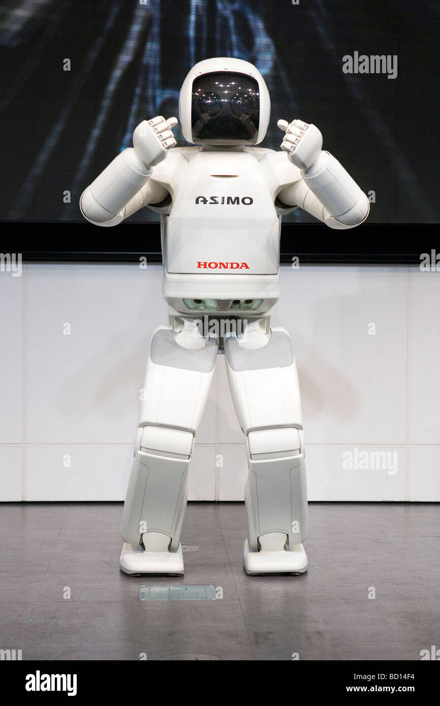Asimo a humanoid robot created by Honda giving a performance on stage at  the company headquarters in Tokyo Stock Photo - Alamy