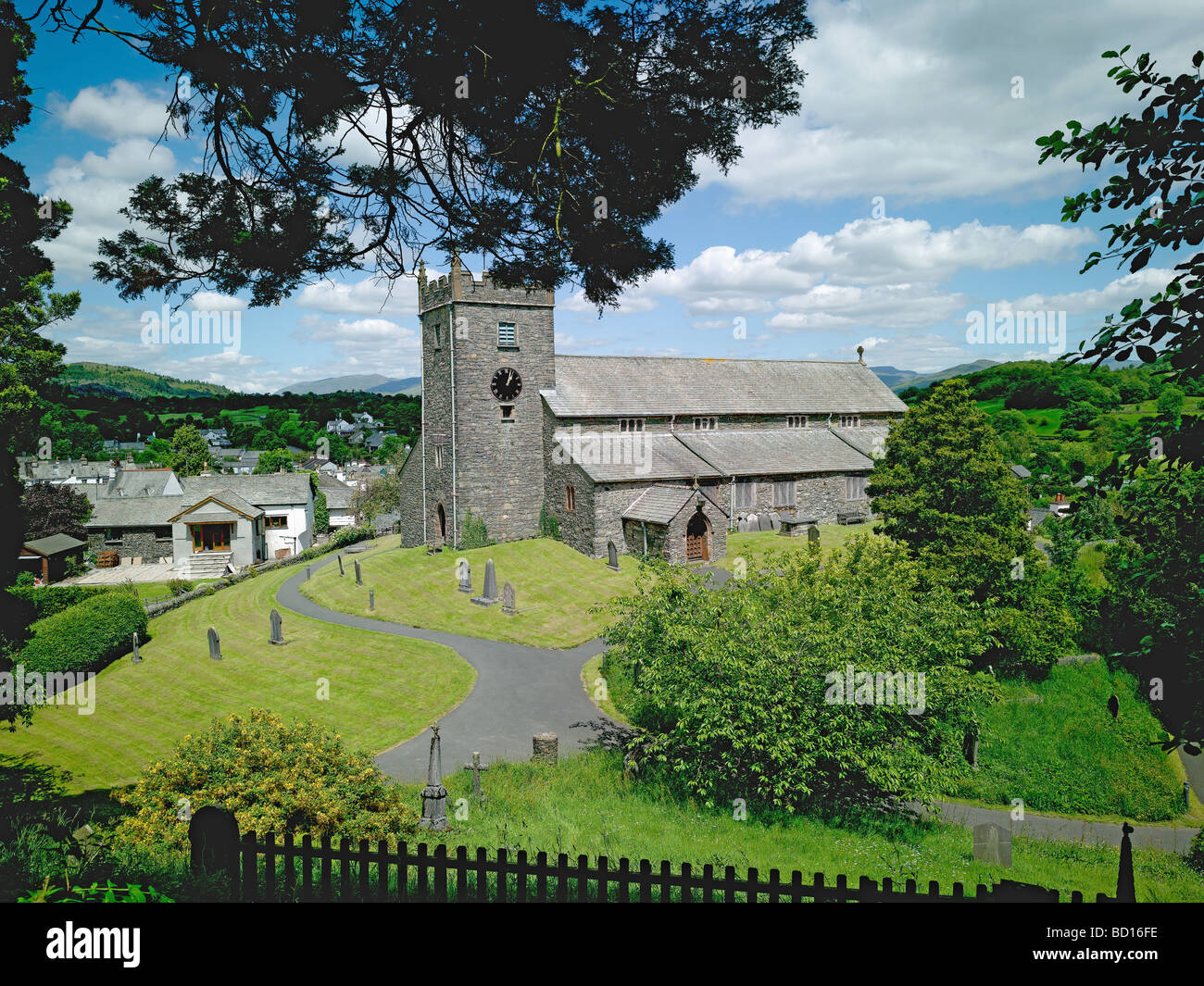Hawkshead and the 15th century parish church of St Michael and all Angels in summer Cumbria England UK United Kingdom GB Great Britain Stock Photo