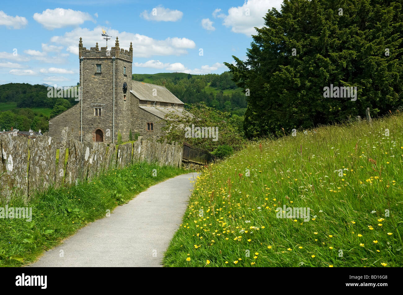 15th century parish church St Michael and all Angels in summer Hawkshead Lake District National Park Cumbria England UK United Kingdom Great Britain Stock Photo
