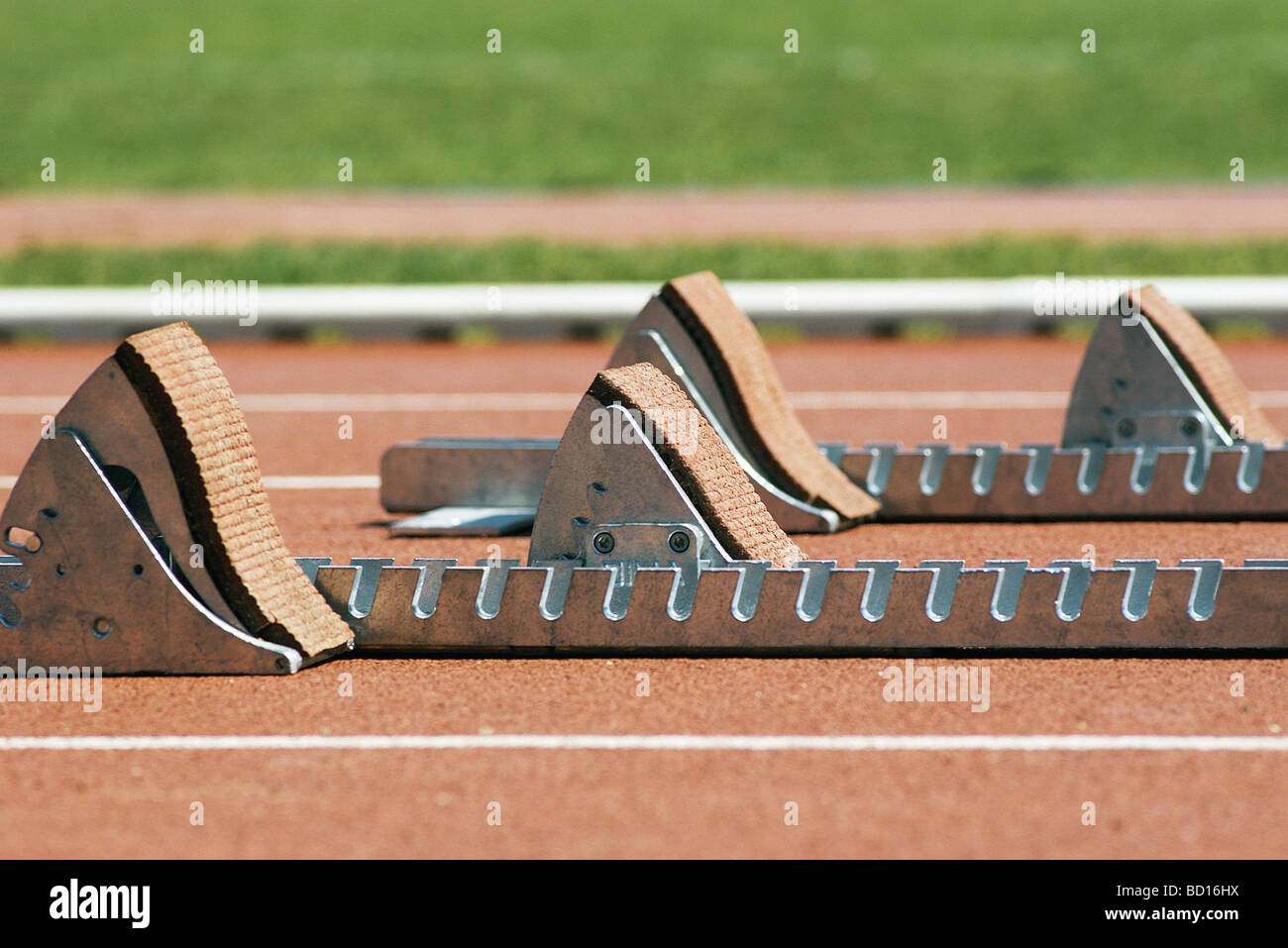 Starting blocks on running track Stock Photo Alamy