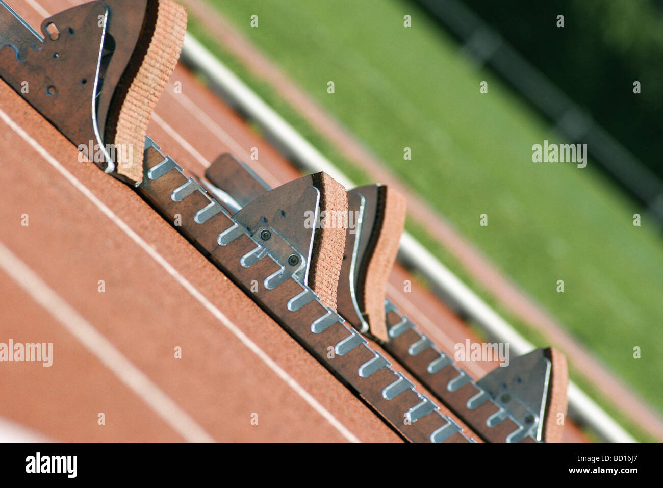 Starting blocks on running track Stock Photo Alamy