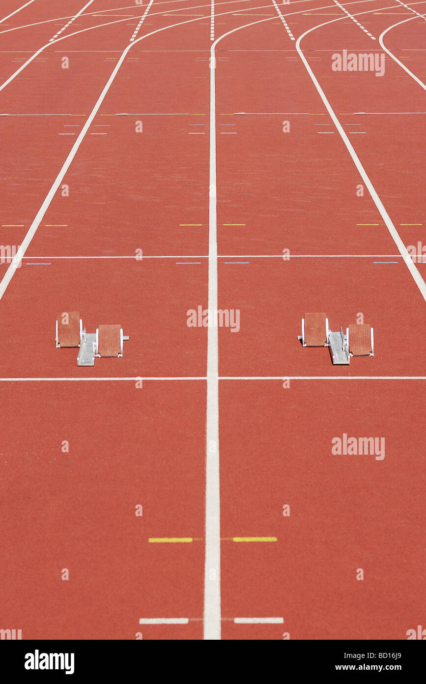 Starting blocks on running track Stock Photo Alamy