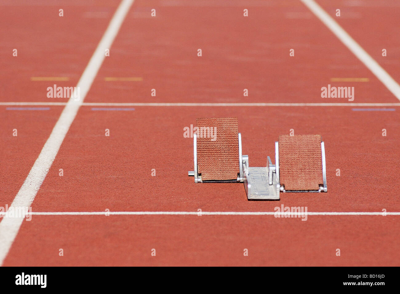 Starting blocks on running track Stock Photo Alamy