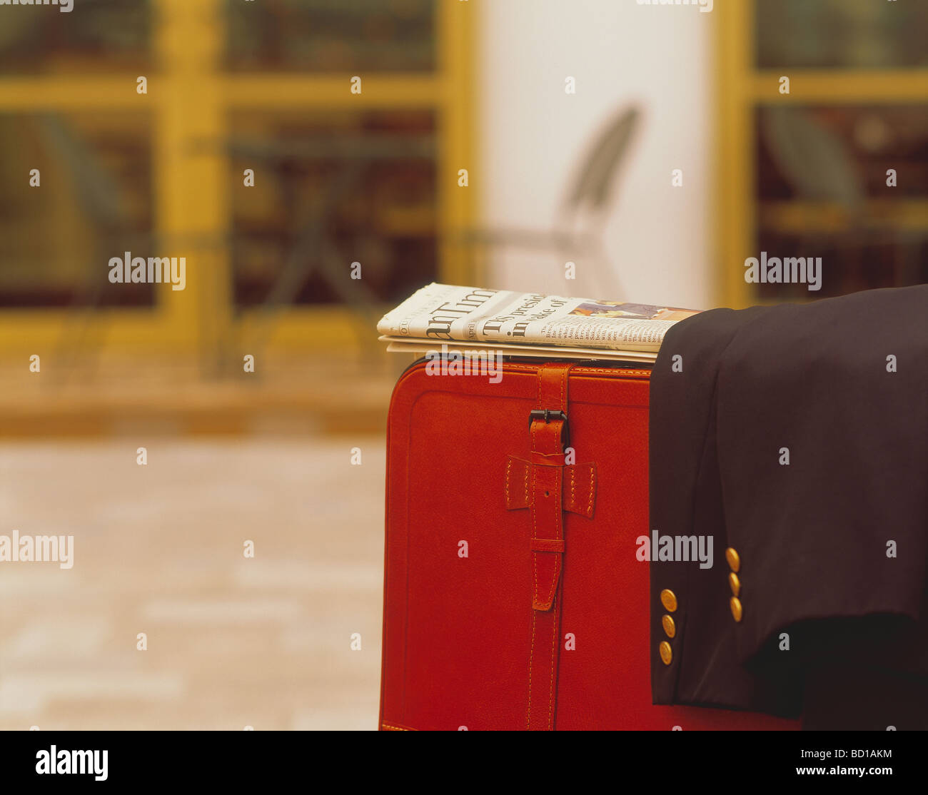 Suitcase and jacket Stock Photo Alamy