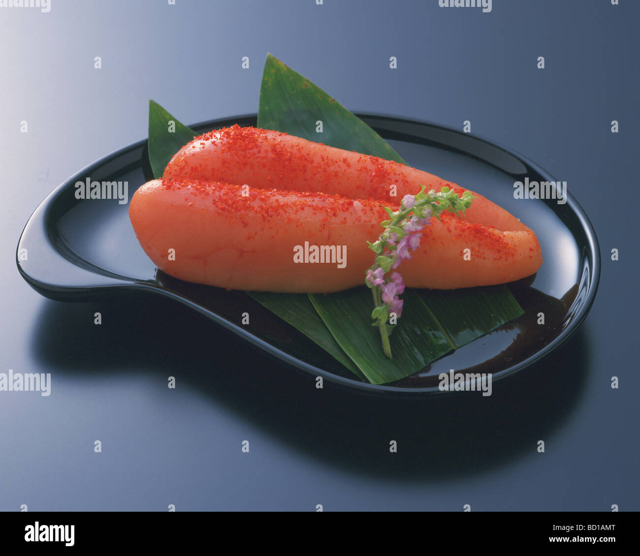 Plate of salted cod roe black background Stock Photo Alamy