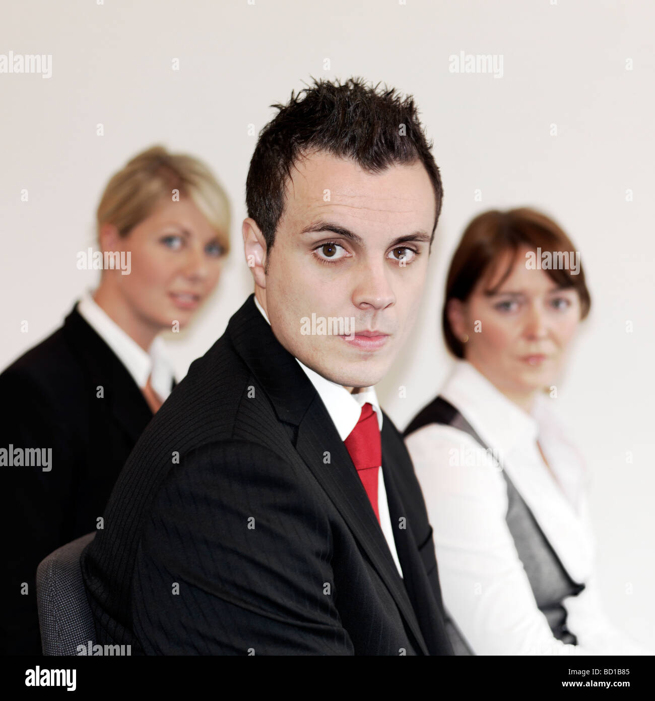 three young business people portrait Stock Photo - Alamy