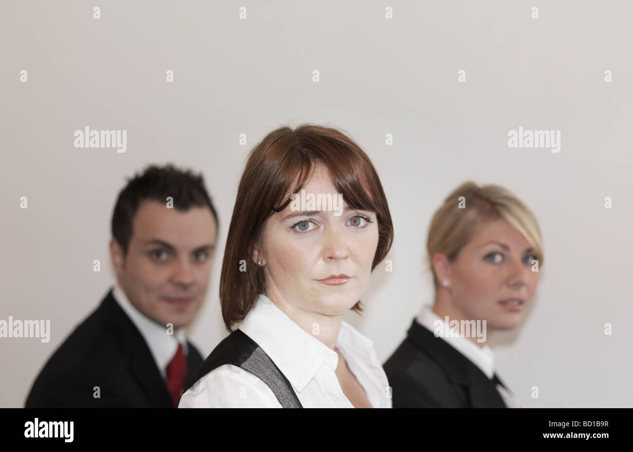 three young business people portrait Stock Photo - Alamy