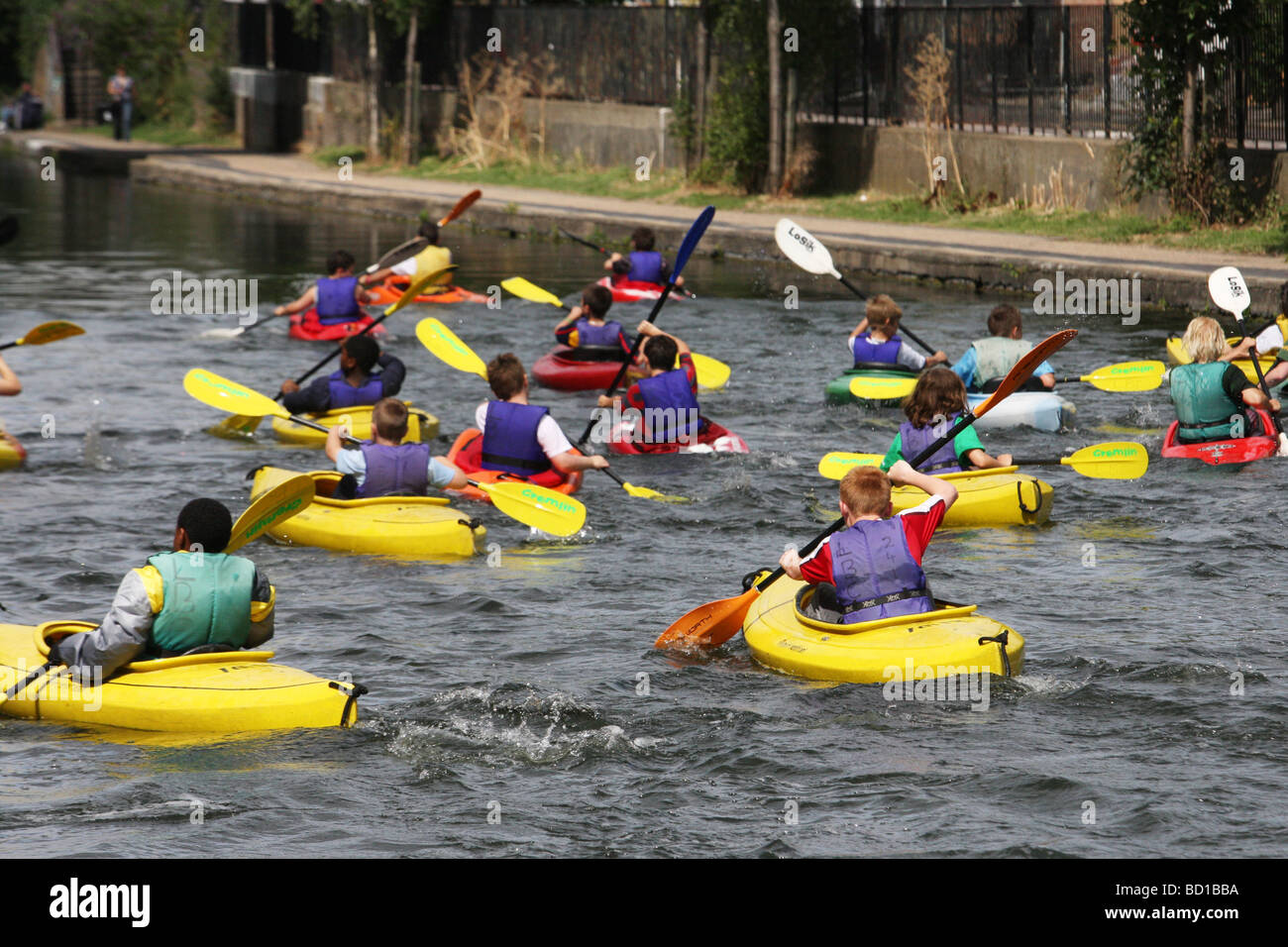 Group teenagers kayaking on regents hires stock photography and images