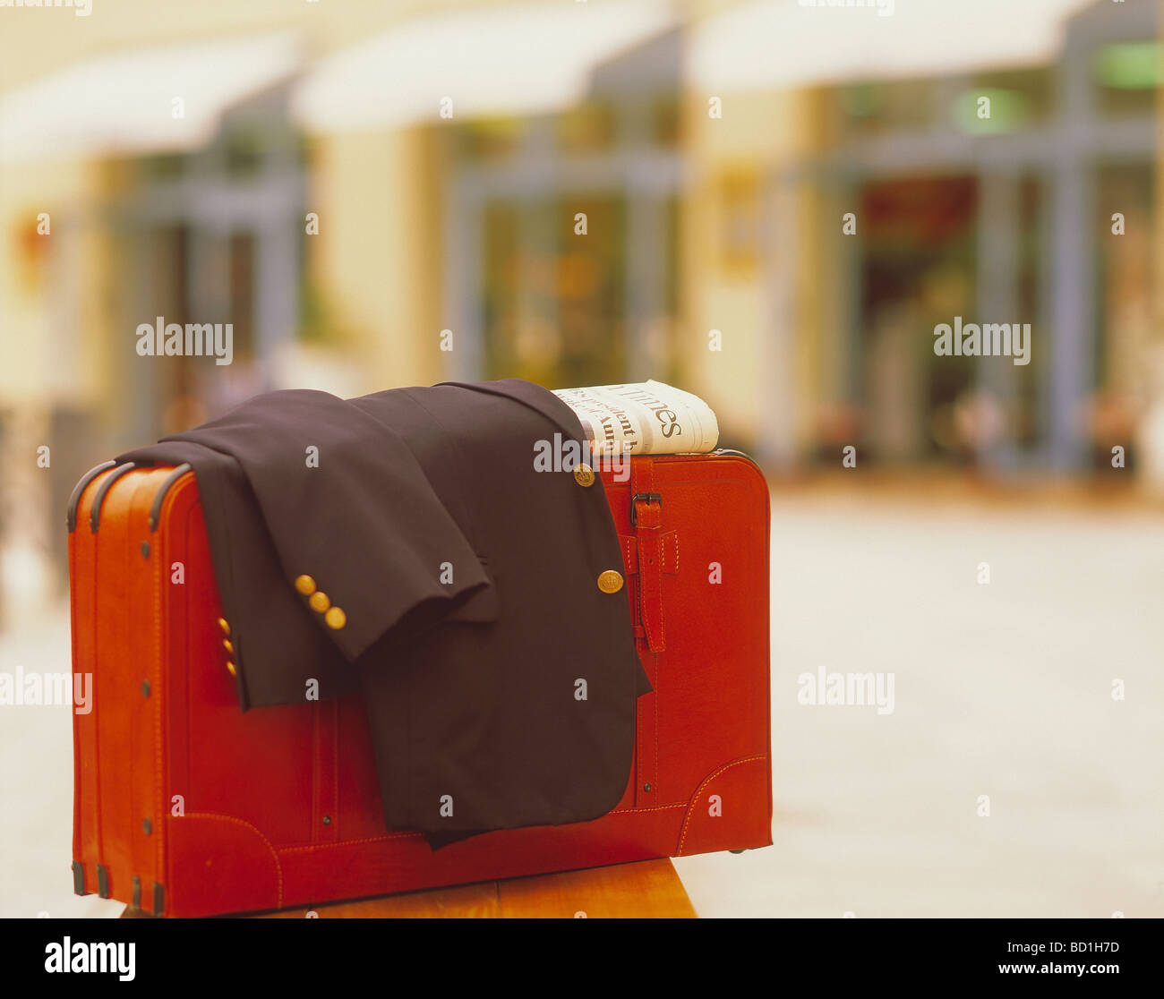 Suitcase and jacket Stock Photo Alamy