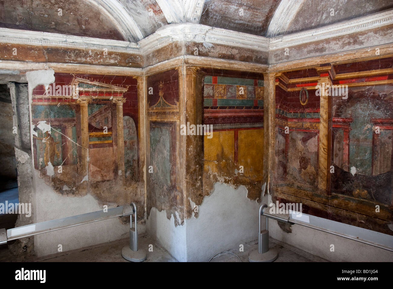 A cubiculum in the villa at Oplontis with ornate stucco moldings and second-style wall paintings. Stock Photo