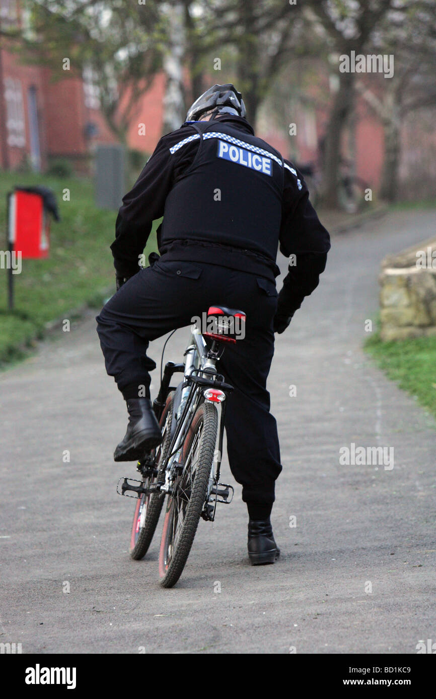 Policeman on a bicycle. Stock Photo