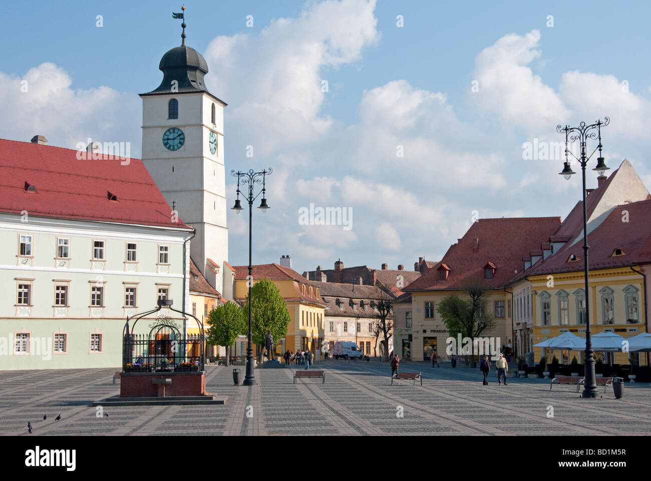Sibiu's Piata Mare Square pedestrian plaza with Council Tower Stock Photo