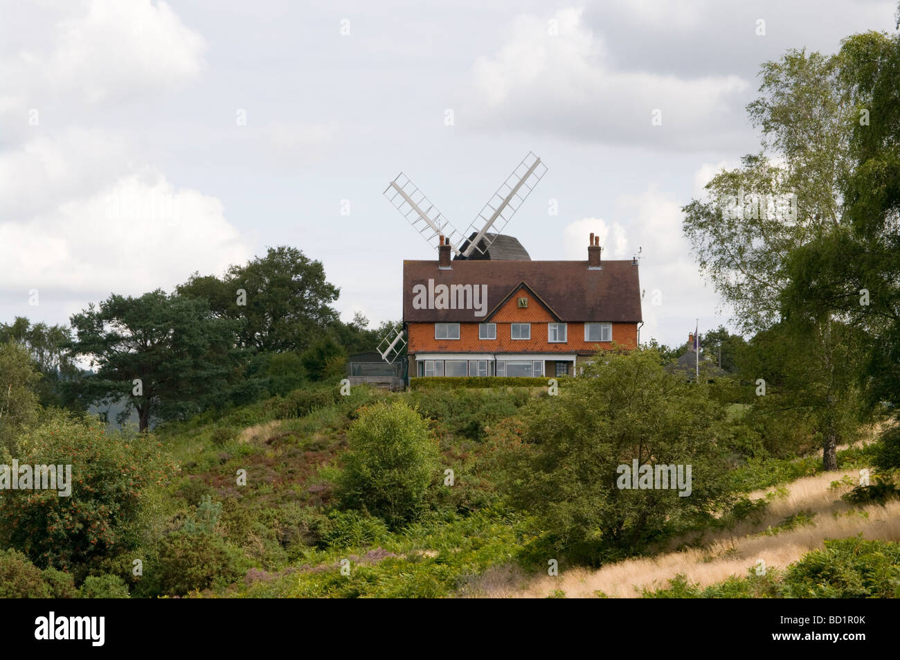 Reigate Heath Golf Club Clubhouse and Windmill Surrey England Stock Photo