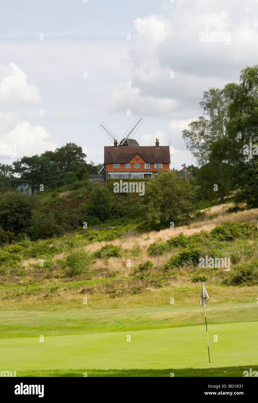 Reigate Heath Golf Course Clubhouse and Windmill Surrey England Stock Photo