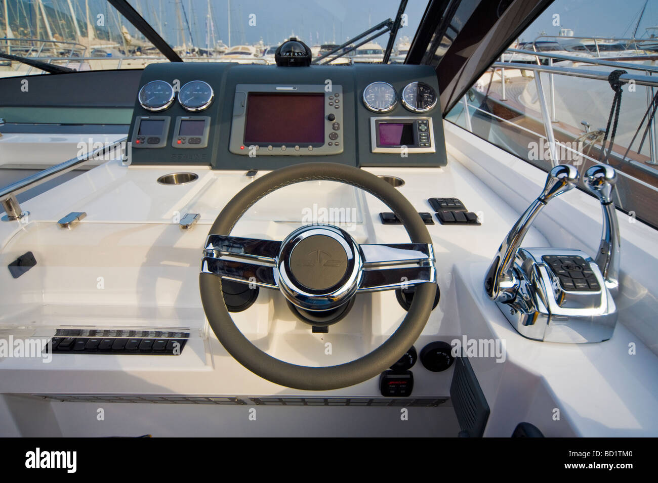 Helm with navigational instruments of a Sealine SC 47 powerboat with ...