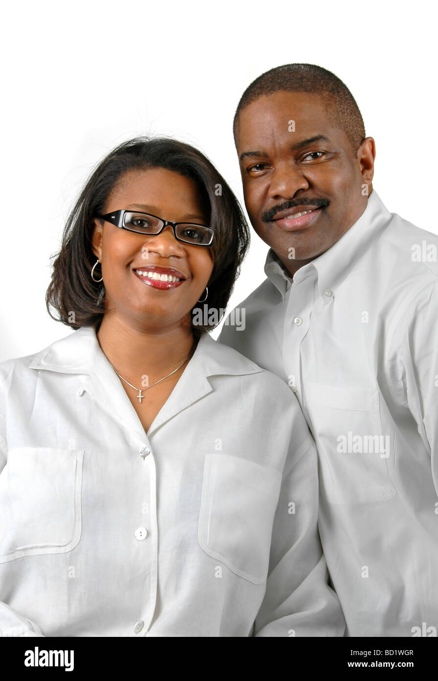 Happy African American couple smiling over a white background Stock ...