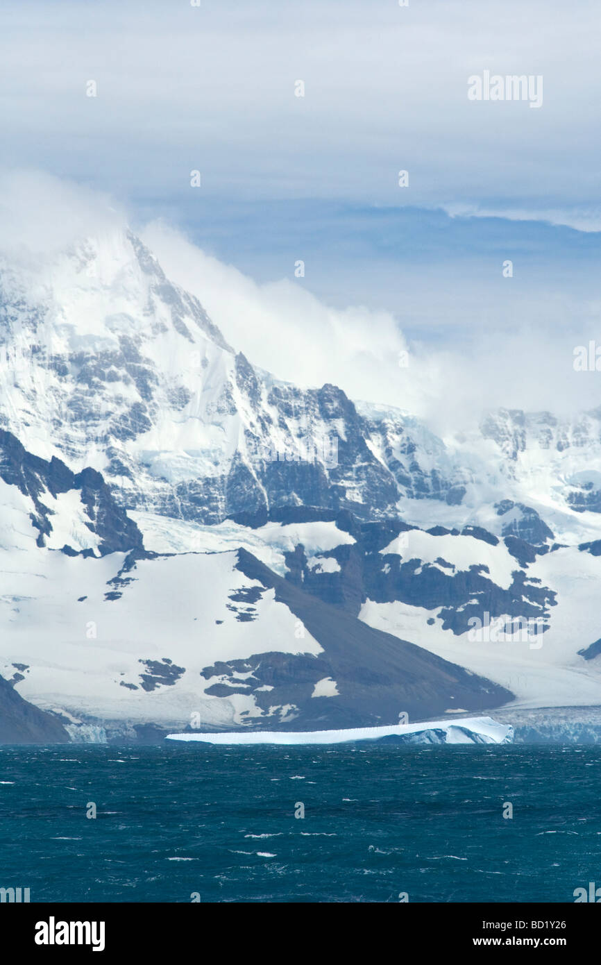 Salvesen Range mountains and Fortuna Glacier tidewater melting into Cumberland Sound South Georgia Antarctica Stock Photo