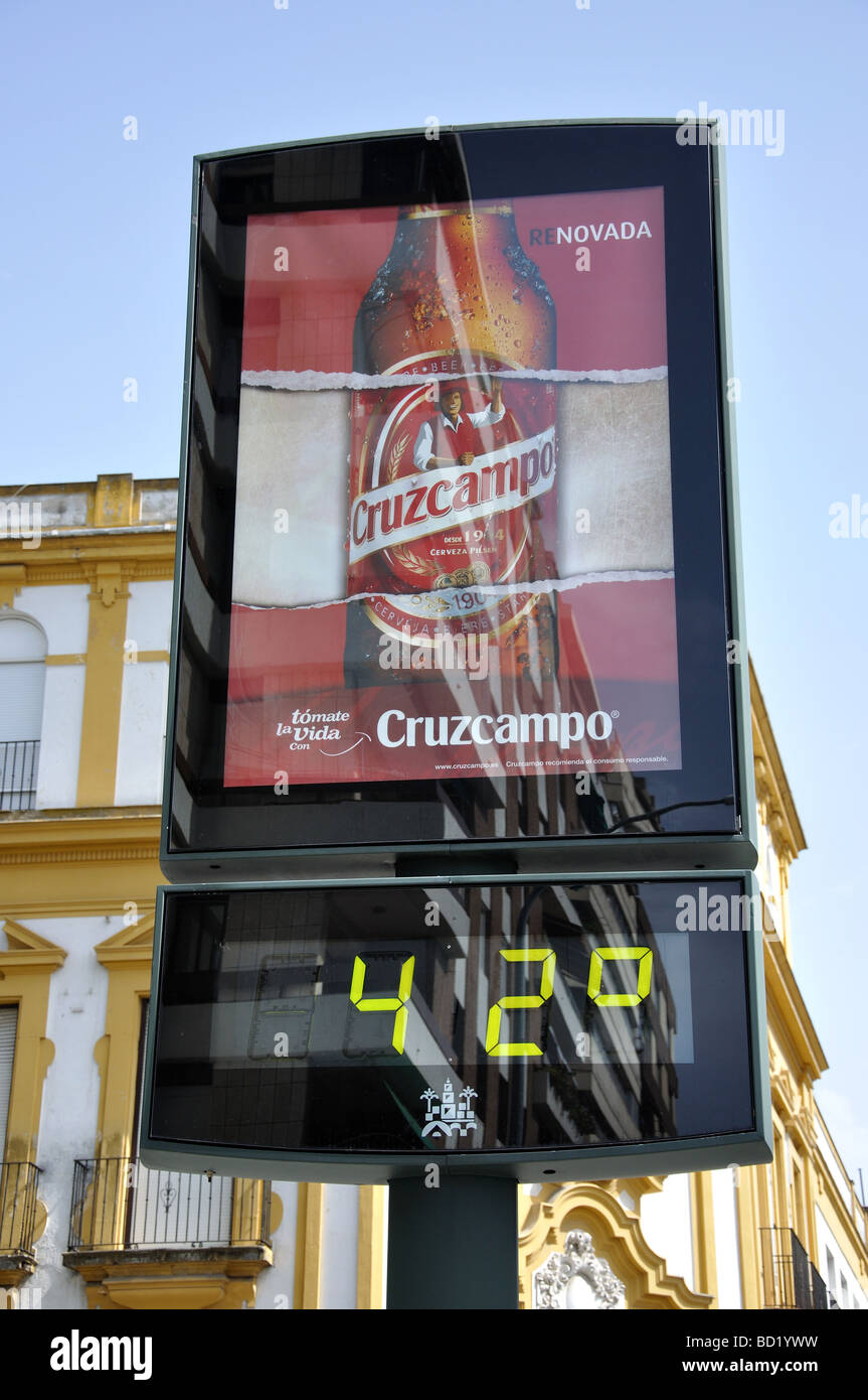 Advertising display showing high temperature, Cordoba, Cordoba Province, Andalucia, Spain Stock Photo