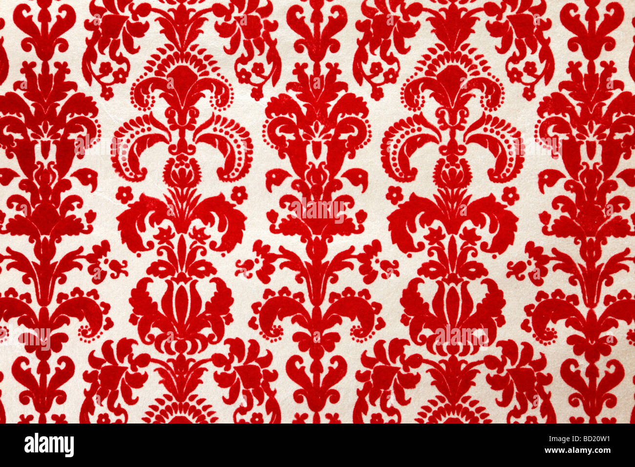 detail of red flock wallpaper pattern Stock Photo