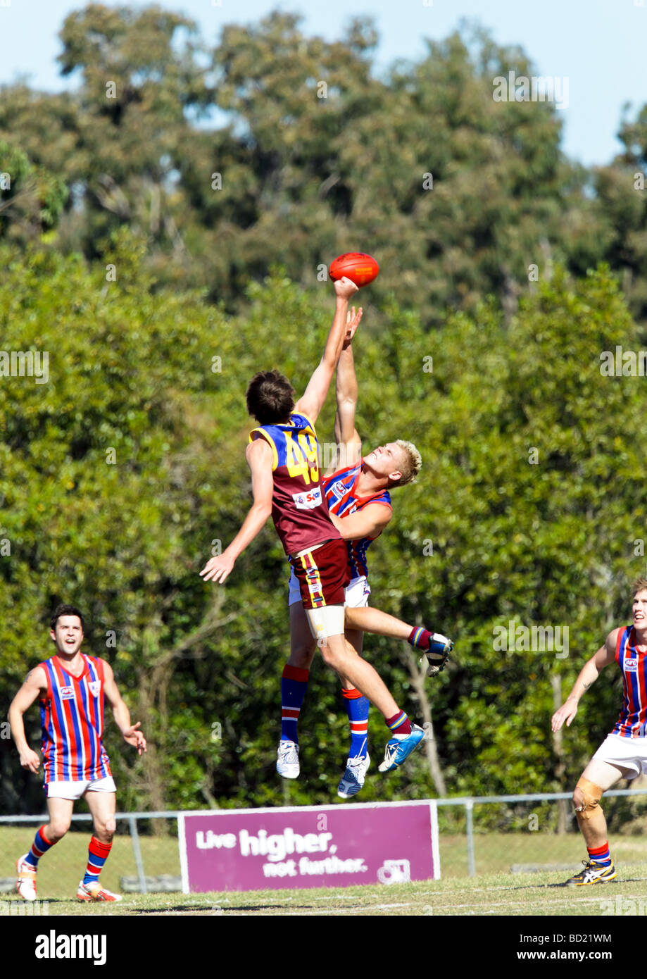 Australian Rules Football being played by two teams in a competition Stock Photo