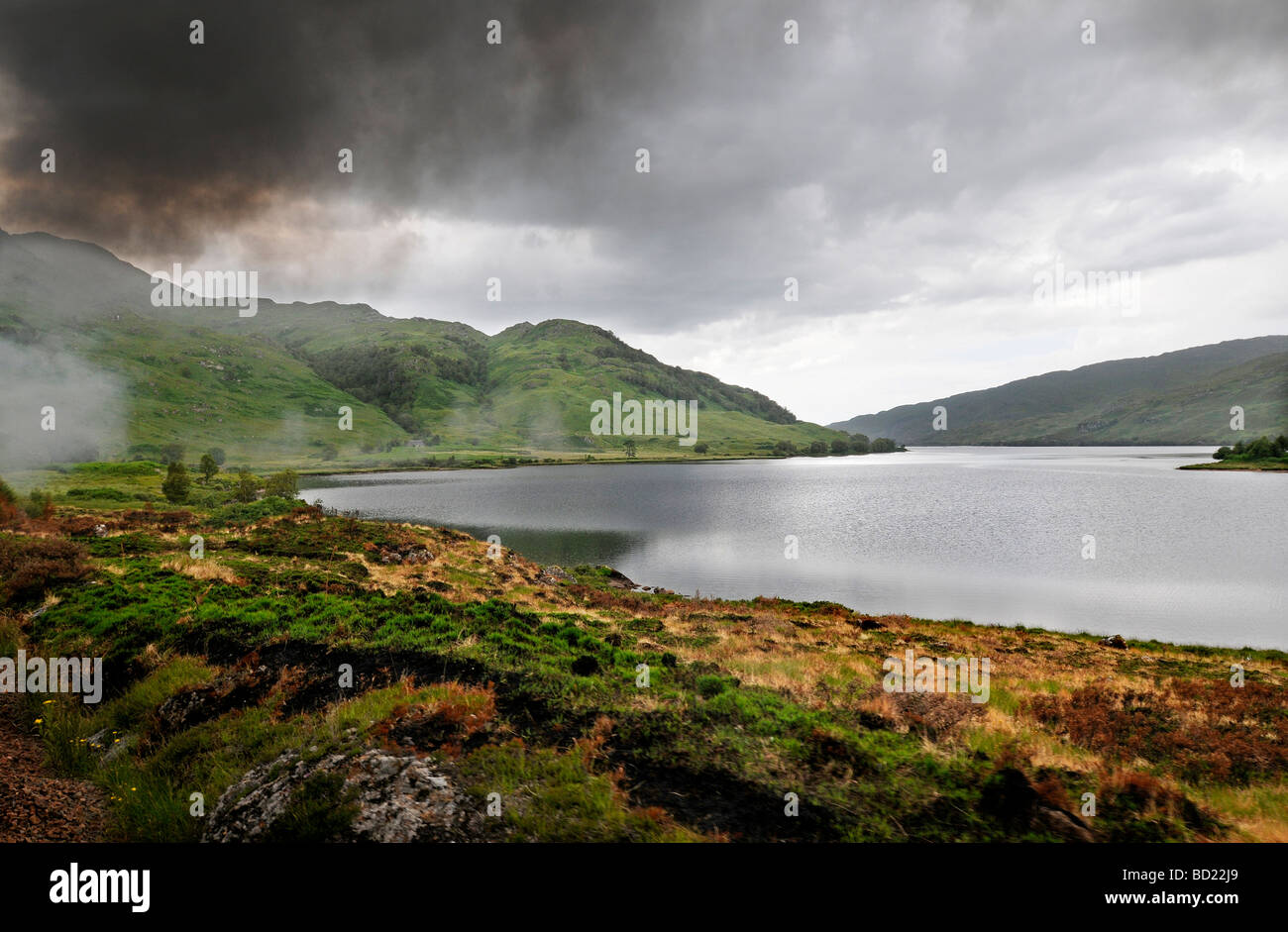 View over Loch Eilt during the Jacobite Steam train Journey from Fort William to Mallaig in Scotland Stock Photo