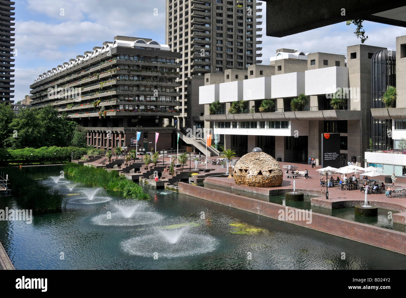 Barbican Centre lakeside terraces with apartments beyond Stock Photo