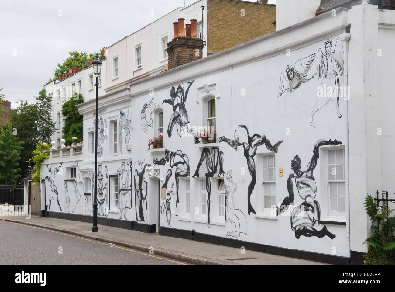 Chelsea Arts Club London redecoration  their building in Old Church Street art work murals by Tony Common. Temporary wall mural  HOMER SYKES Stock Photo