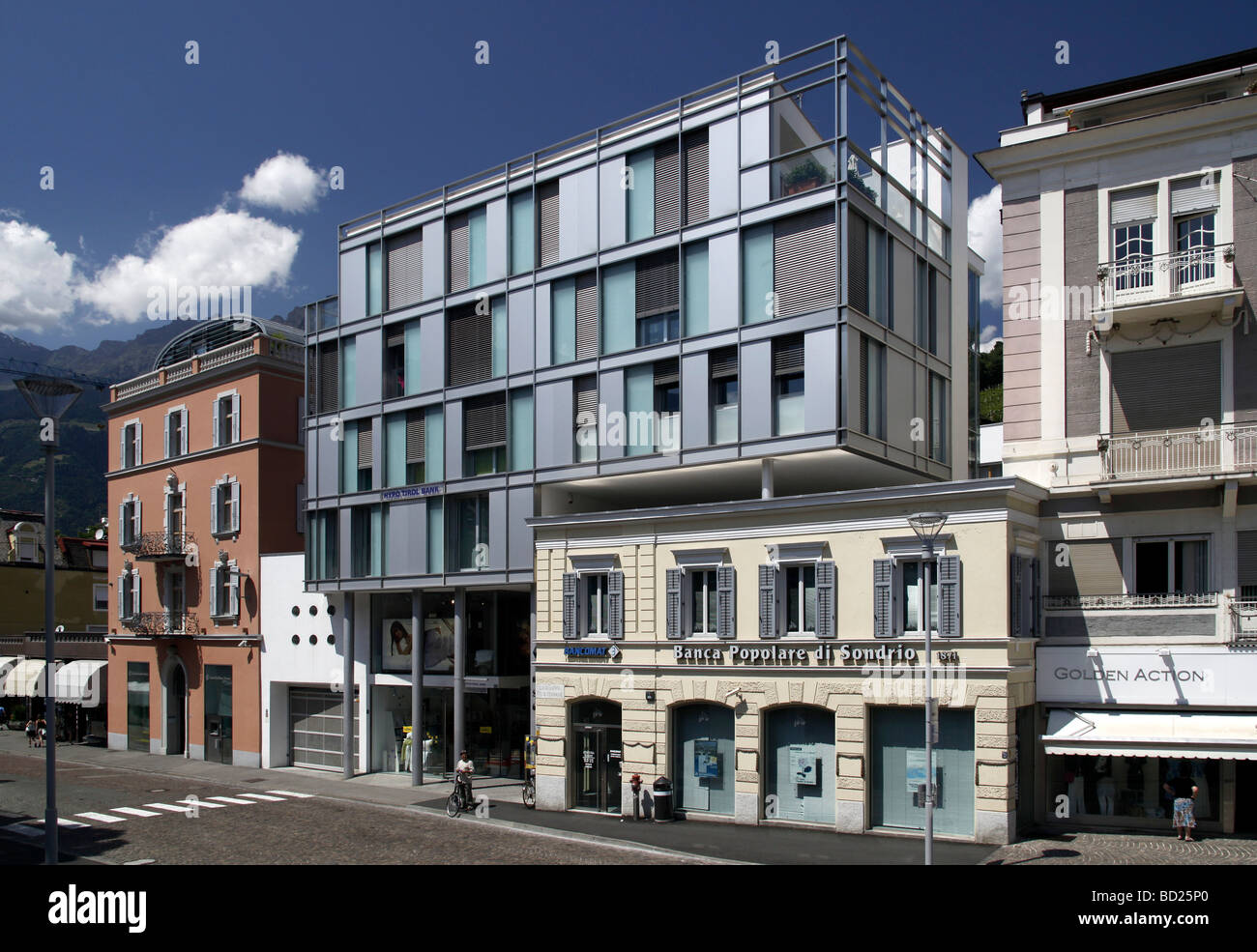 Modern shopping store between traditional buildings, Meran, Merano, Alto Adige, Italy, Europe Stock Photo