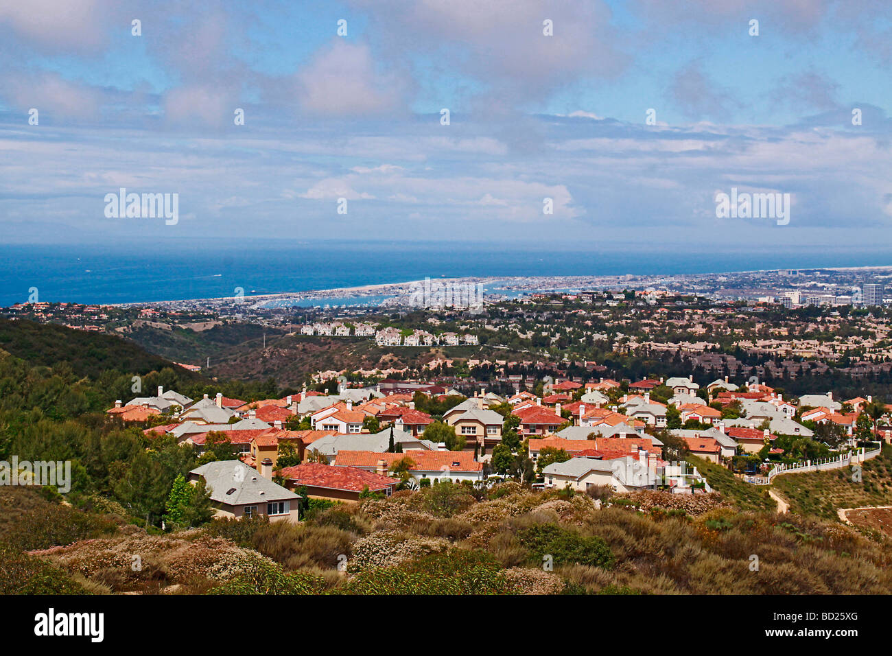 view of New Port Beach from Park ridge with upscale communities in the foreground. Stock Photo