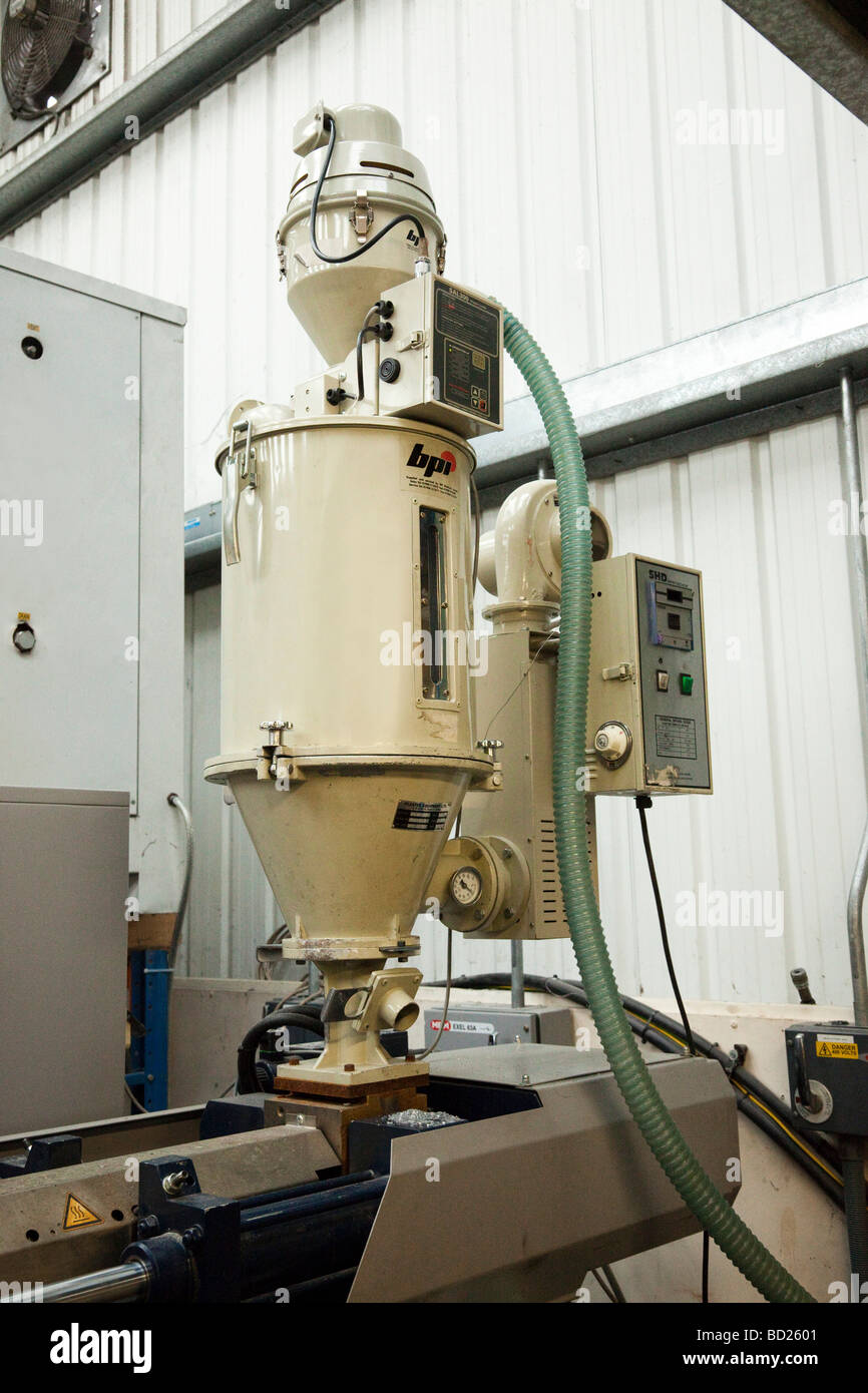 hopper feeder on injection moulding machine Stock Photo Alamy