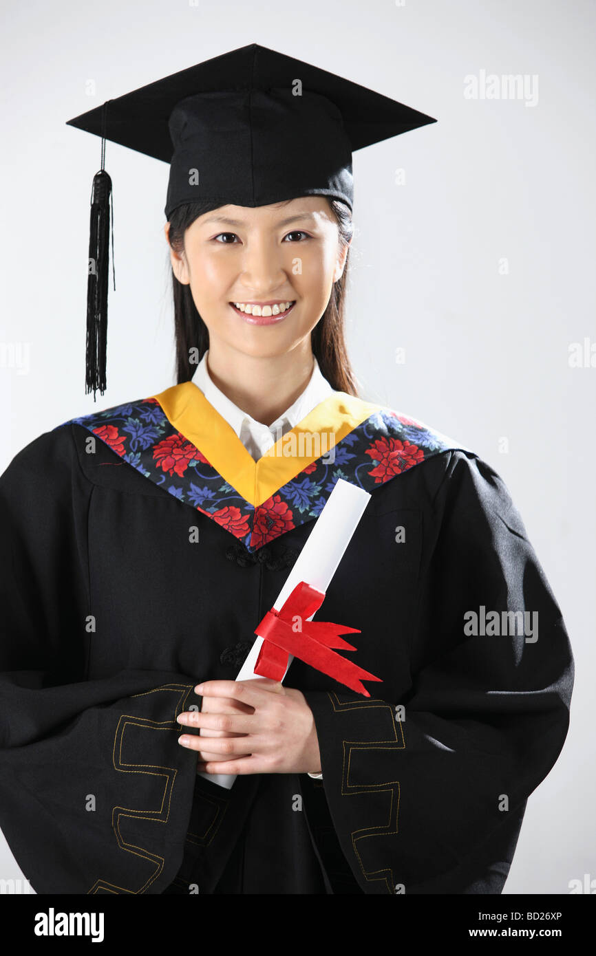 Chinese girl dressing in graduation gown hires stock photography and images Alamy