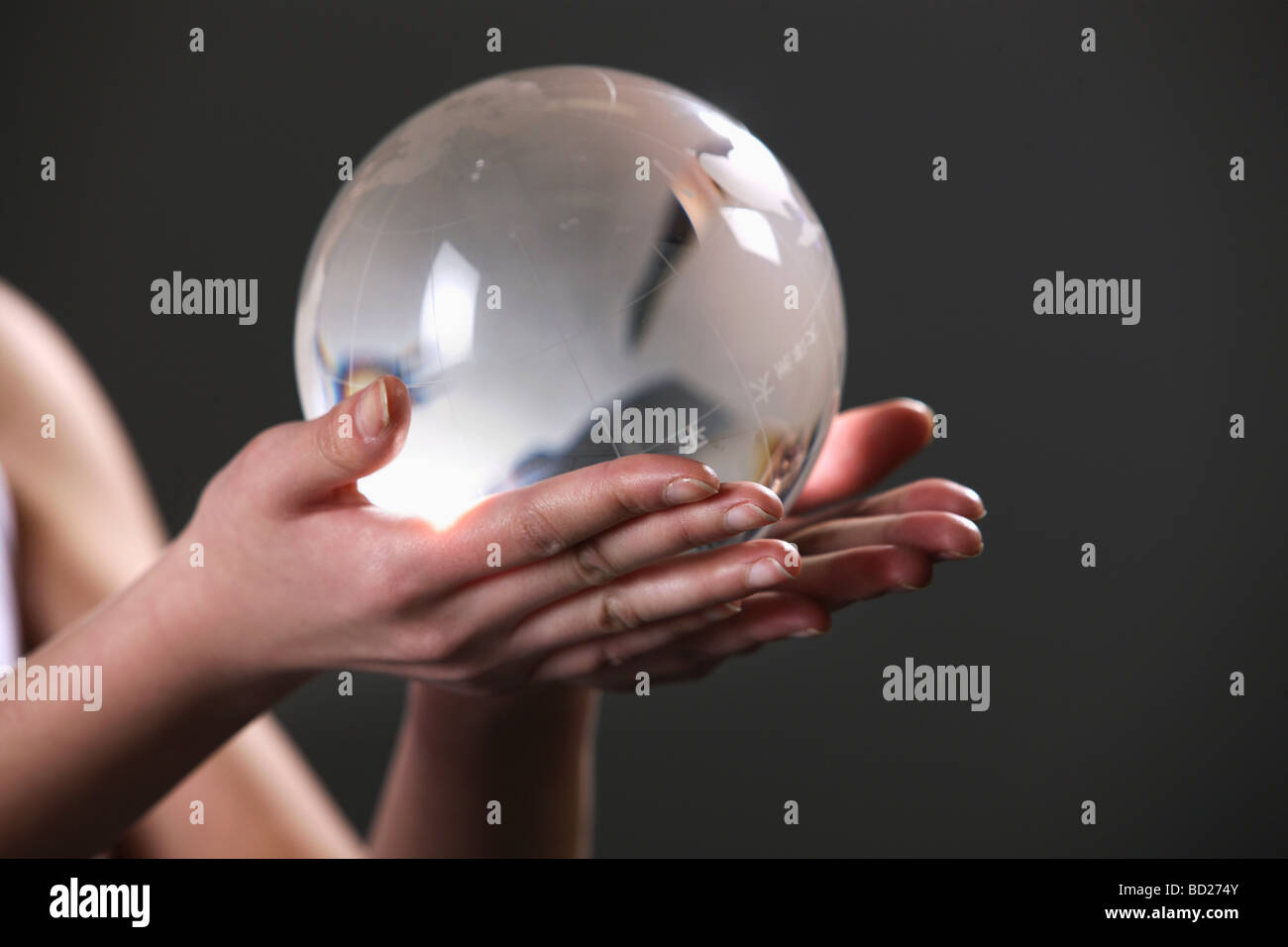Chinese girl holding crystal ball,China Stock Photo Alamy