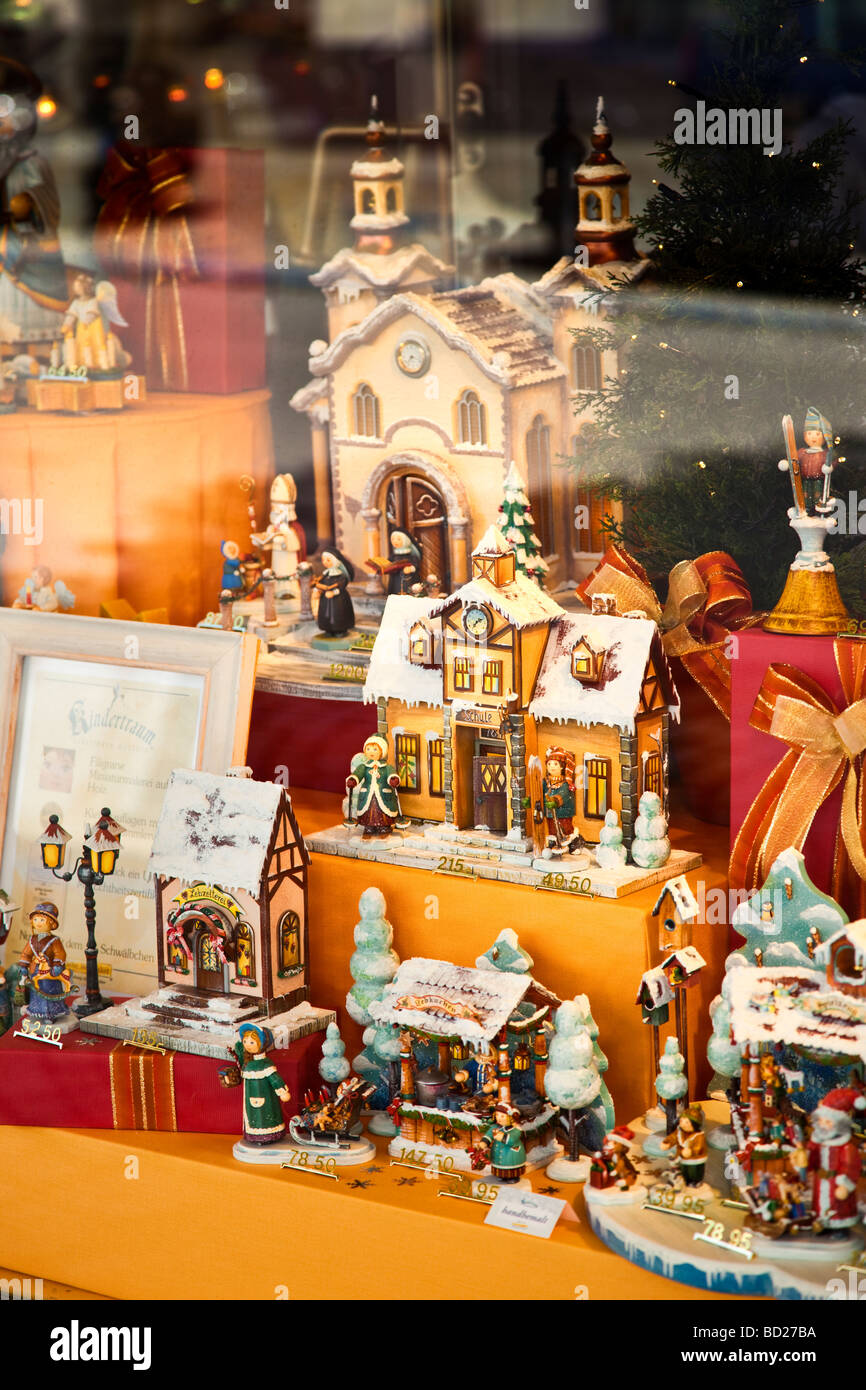Traditional wooden christmas decorations on display in a shop