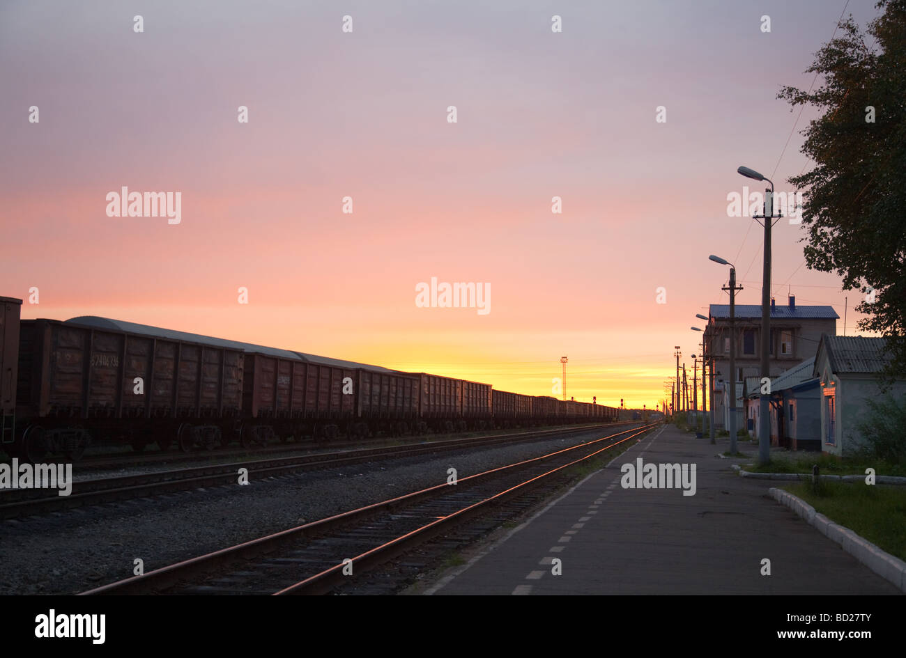 Sunrise on Polar railway station in summer, Inta, Russia Stock Photo