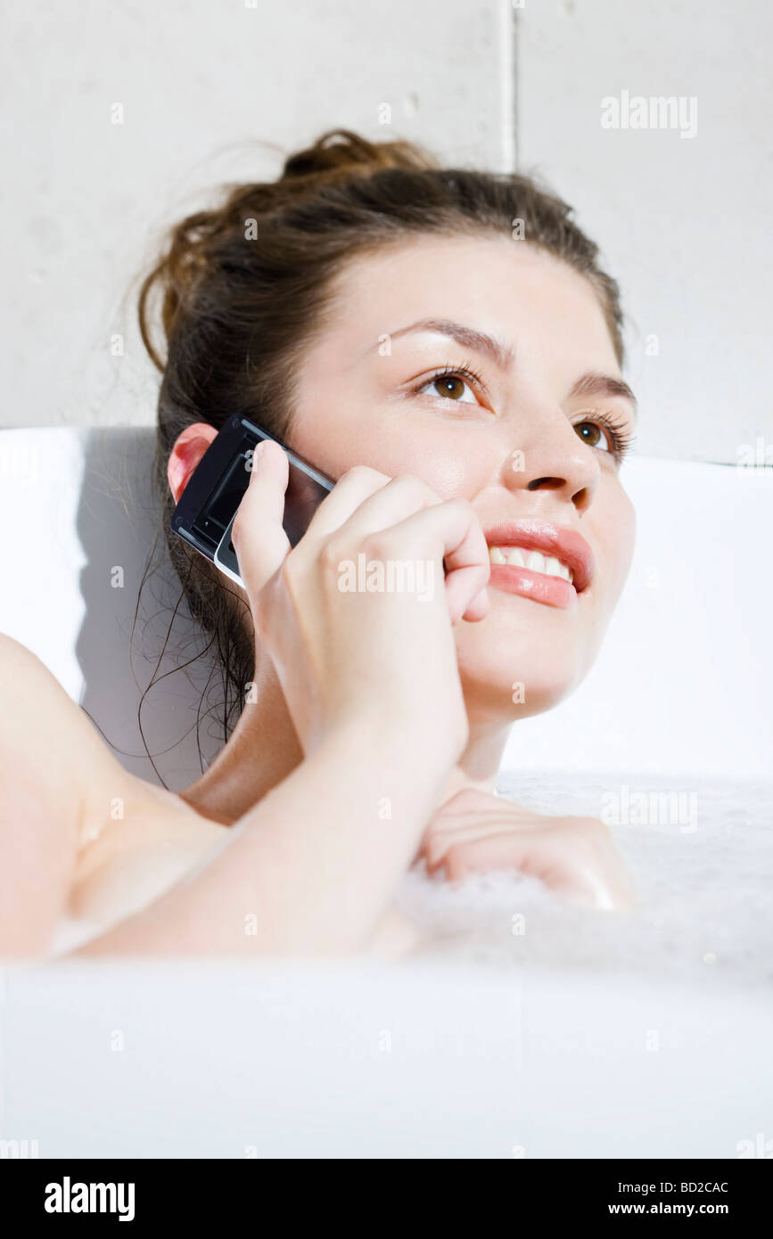 woman using mobile phone in bath Stock Photo Alamy