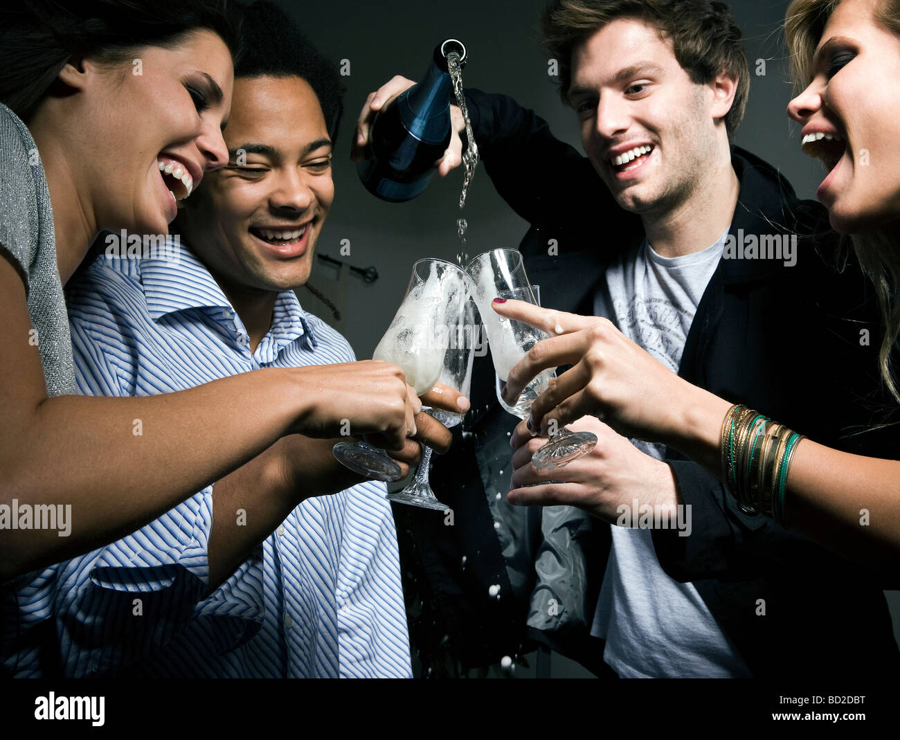 Two couples champagne Stock Photo