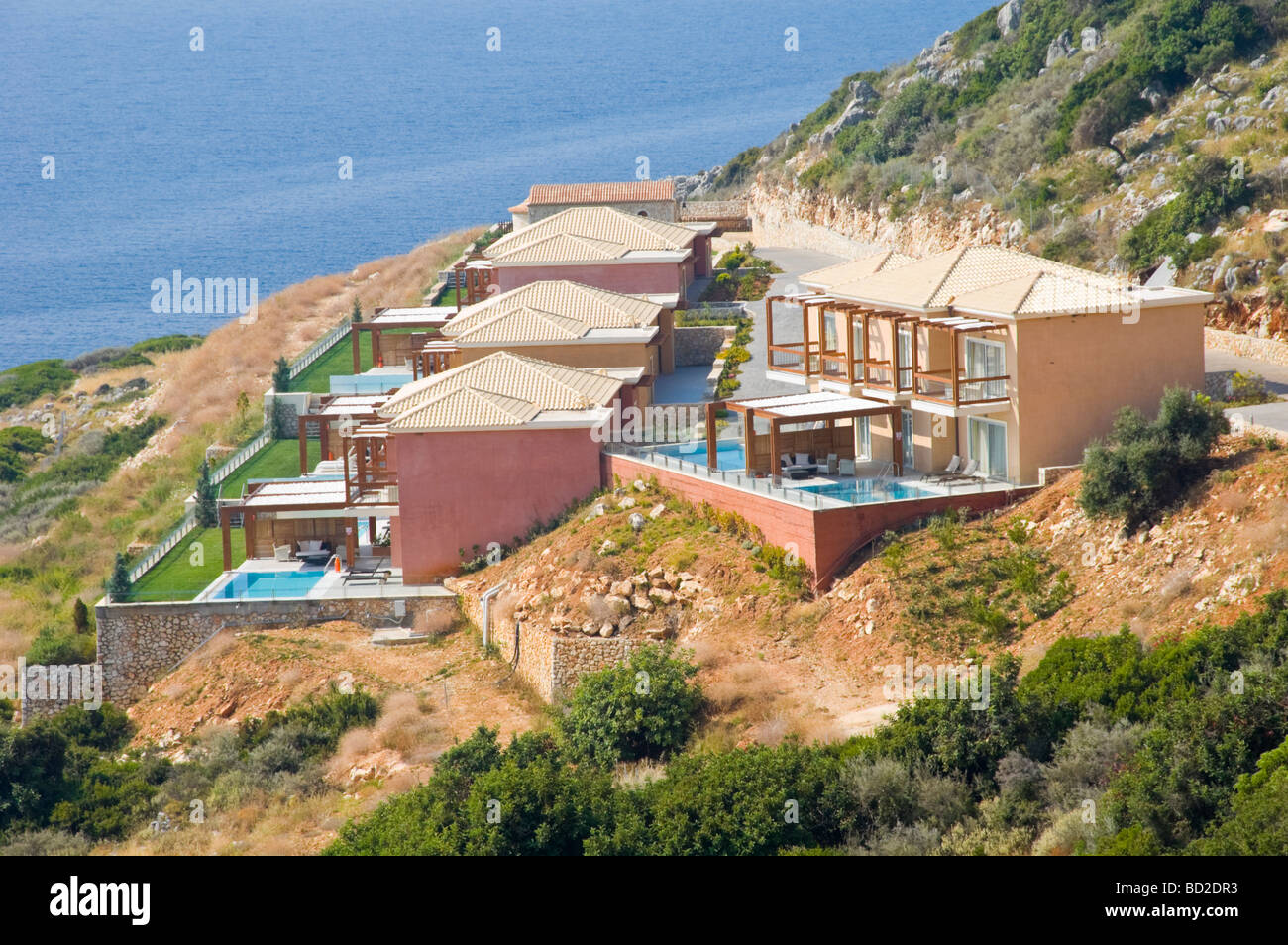 Holiday resort on hillside near Skala on the Greek island of Kefalonia Greece GR Stock Photo