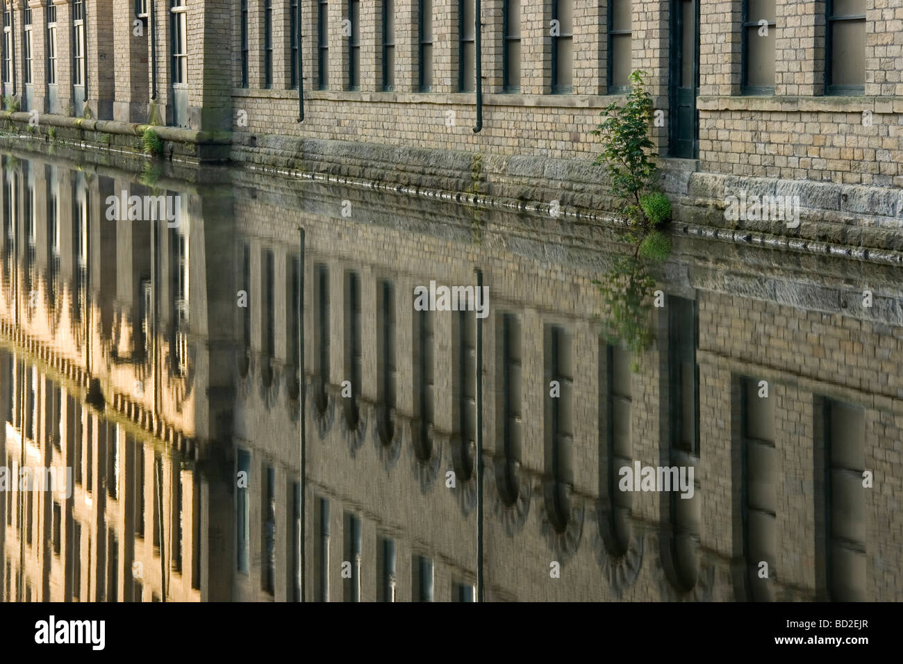 Reflection of the buildings at Salts Mill, Saltaire, a UNESCO world