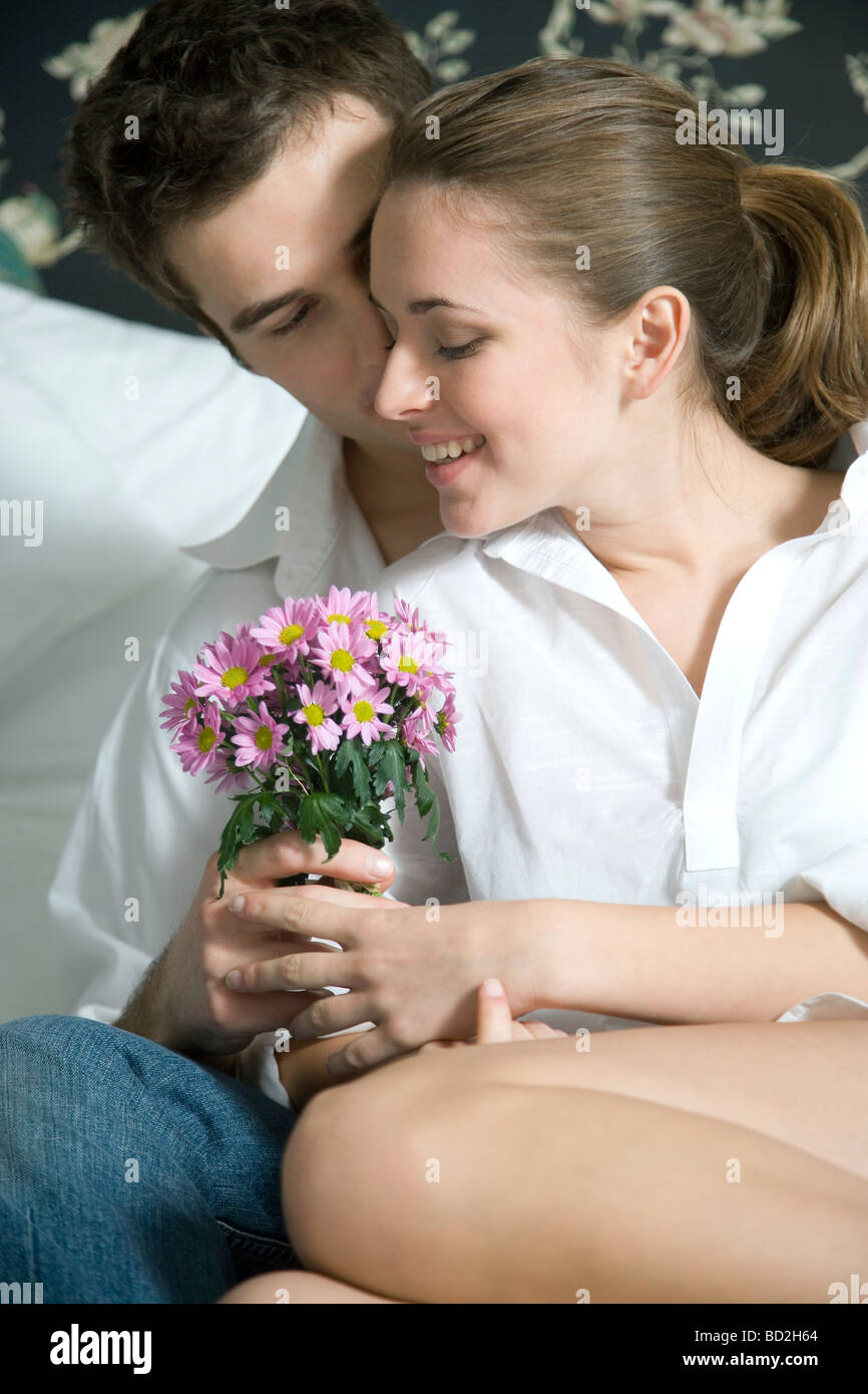 man giving flowers Stock Photo Alamy