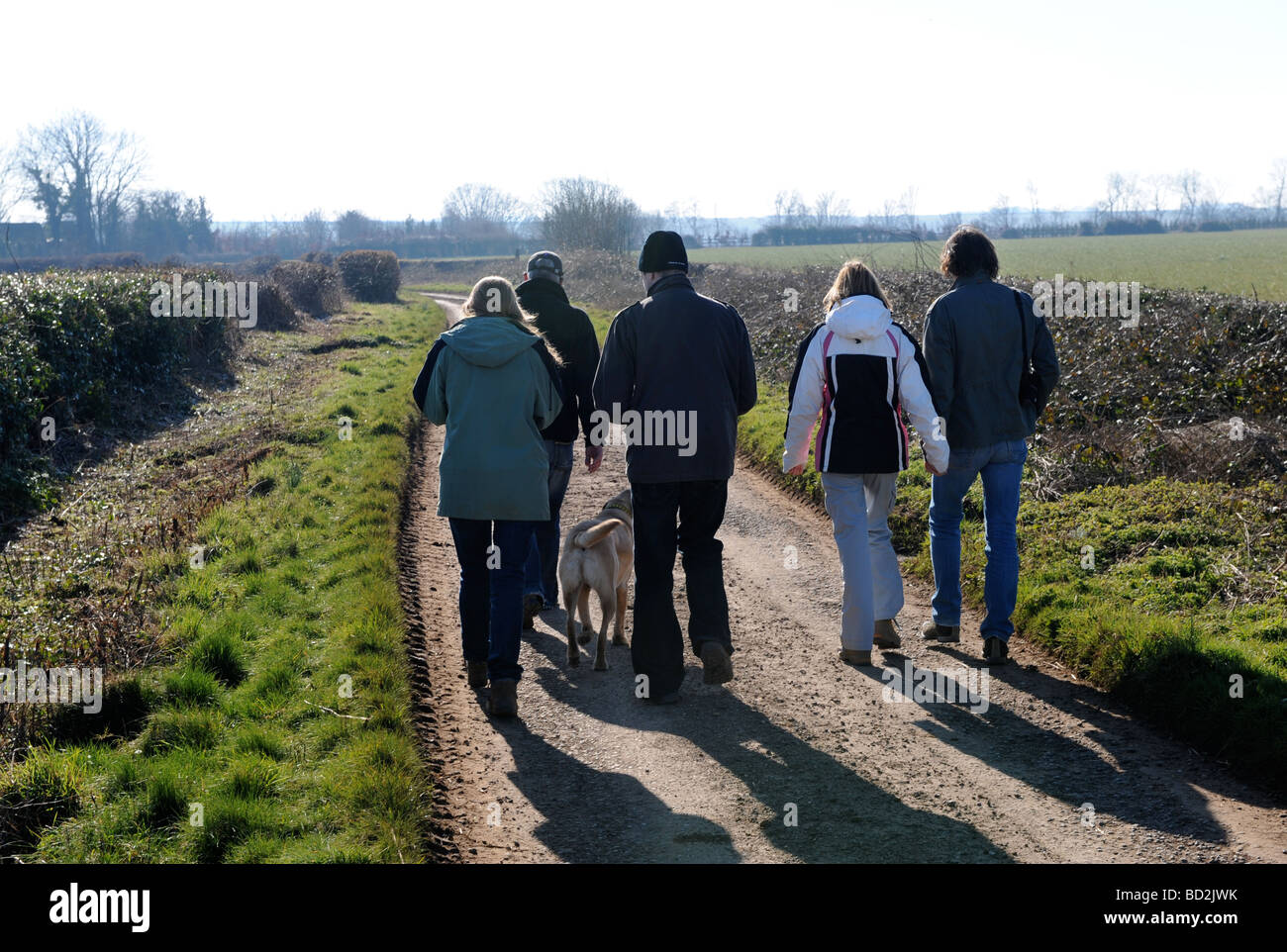 Group walking on country road hi-res stock photography and images - Alamy