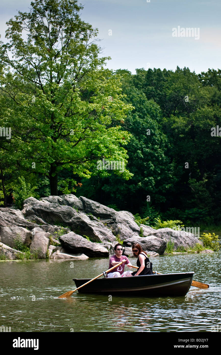 Couple rowing in boat in the Central Park, New York City. Stock Photo